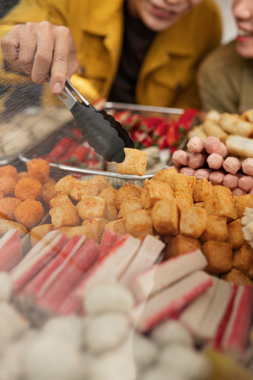 high-angle-people-with-delicious-food
